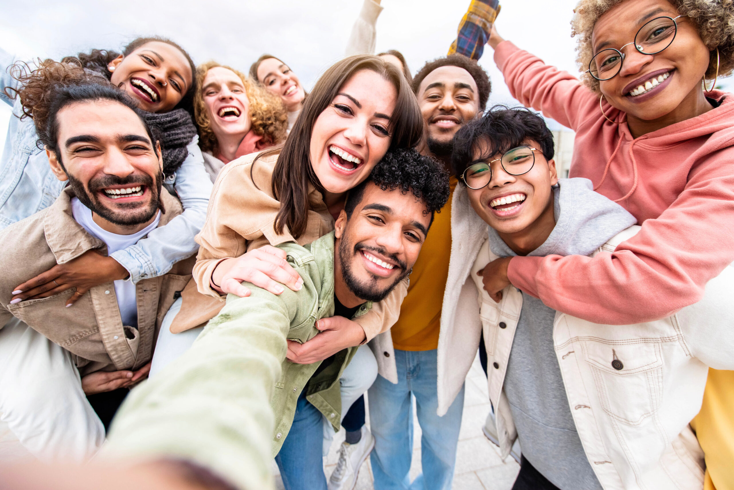 Multiracial friends group taking selfie portrait outside - Happy multi cultural people smiling at camera - Human resources, college students, friendship and community concept